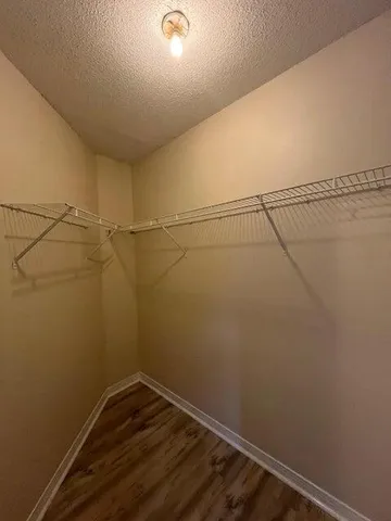 a view of a room with racks on the wall