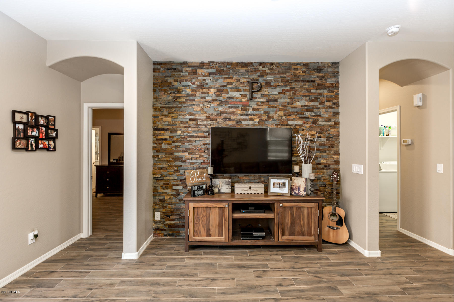 3250 West Florimond Road Phoenix, AZ 85086 - Photo 24 of 31 Media Center with Stone Accent Wall