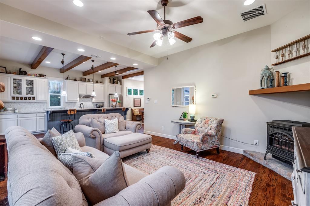 322 Red Maple Road Gunter, TX 75058 - Photo 15 of 33 a living room with furniture and a fireplace