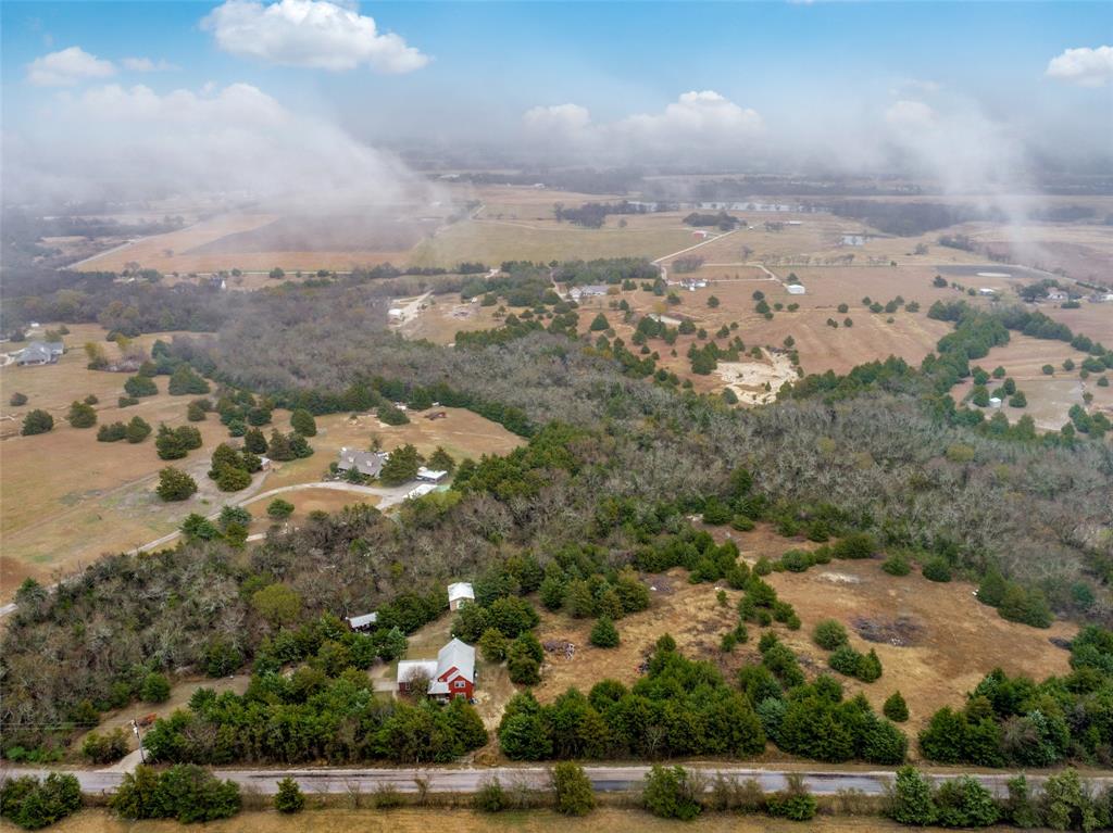 322 Red Maple Road Gunter, TX 75058 - Photo 31 of 33 an aerial view of houses with yard