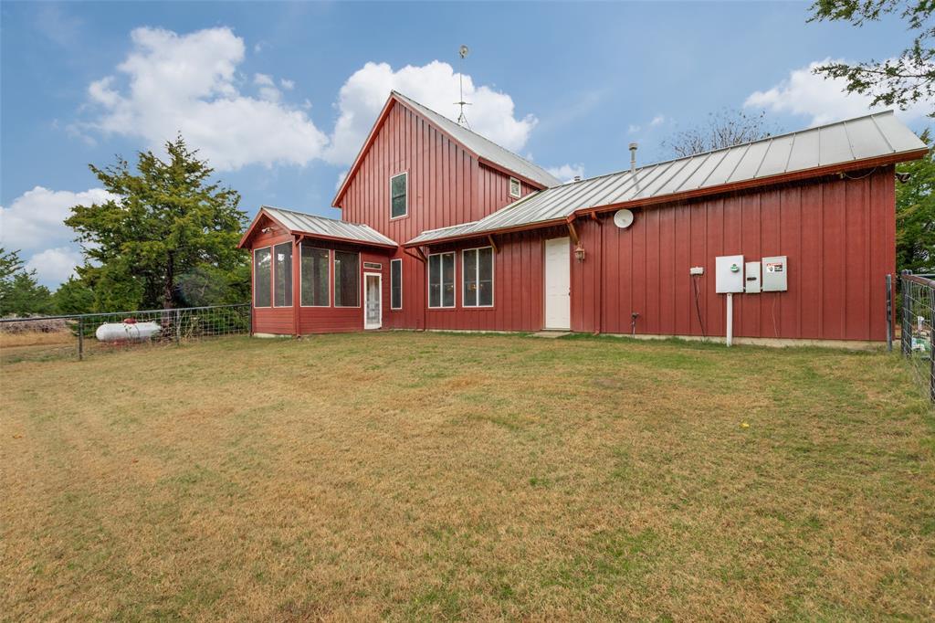 322 Red Maple Road Gunter, TX 75058 - Photo 32 of 33 a view of a house with a yard