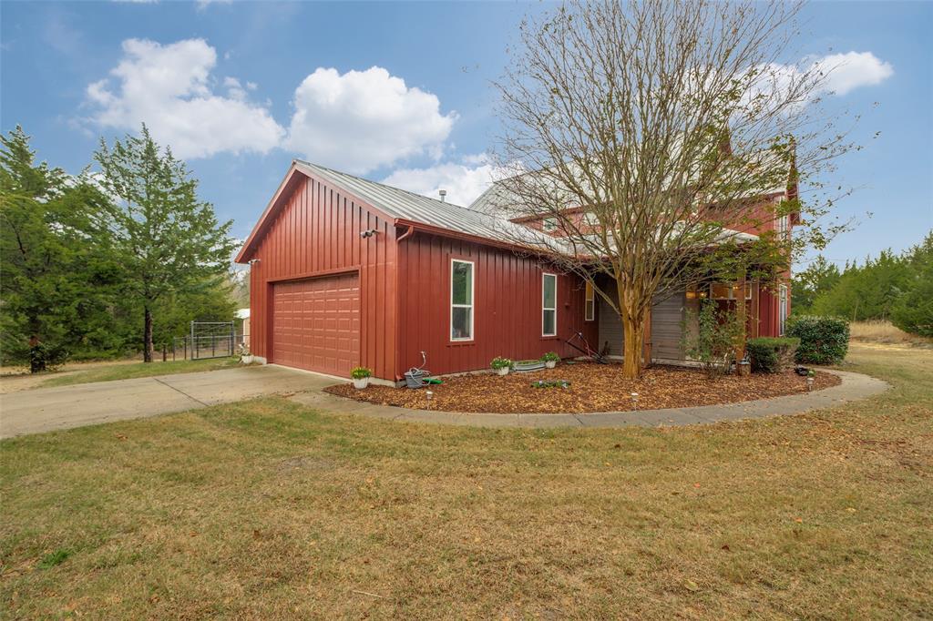 322 Red Maple Road Gunter, TX 75058 - Photo 6 of 33 a view of a yard with a house