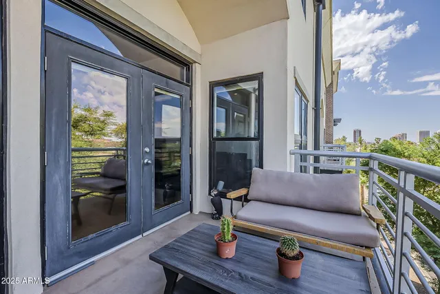 a roof deck with couch