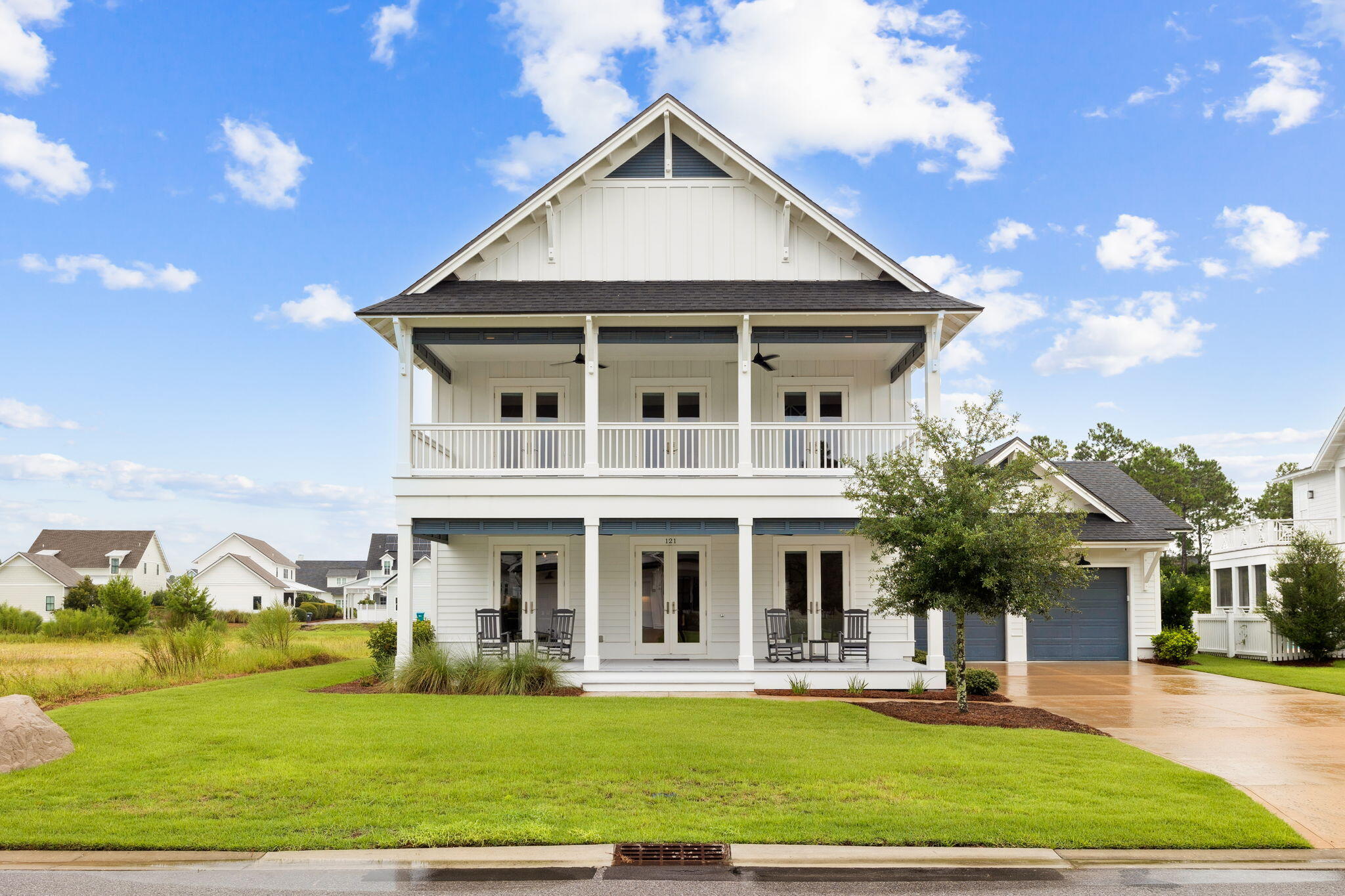 121 Needle Cast Ln Inlet Beach Inlet Beach, FL 32461 - Photo 11 of 63 a front view of a house with a yard