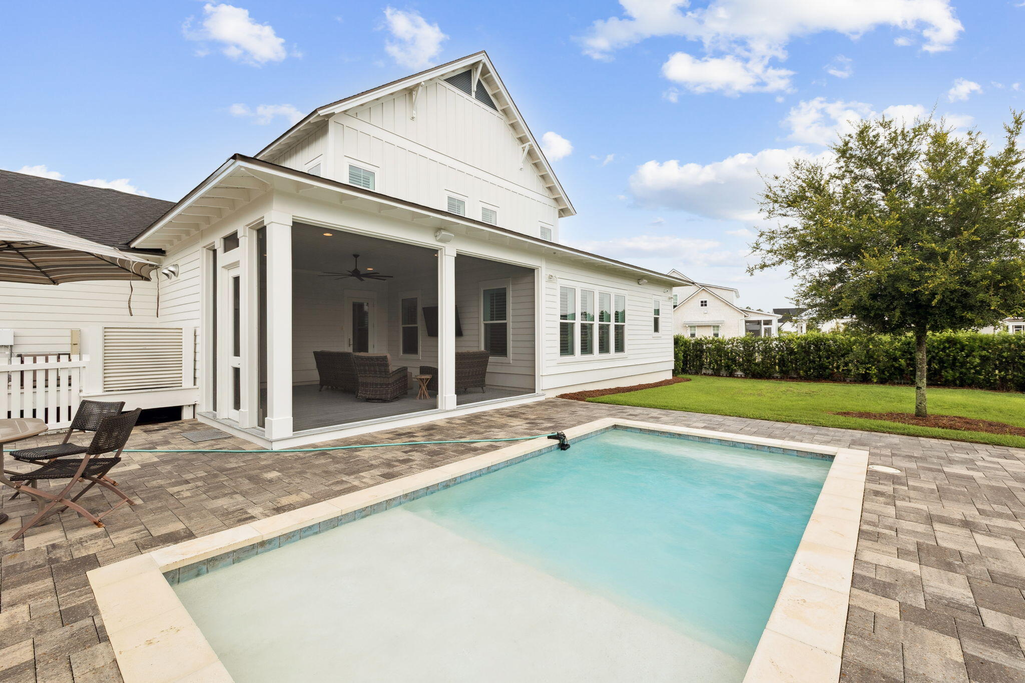 121 Needle Cast Ln Inlet Beach Inlet Beach, FL 32461 - Photo 20 of 63 a view of a house with a swimming pool and sitting area