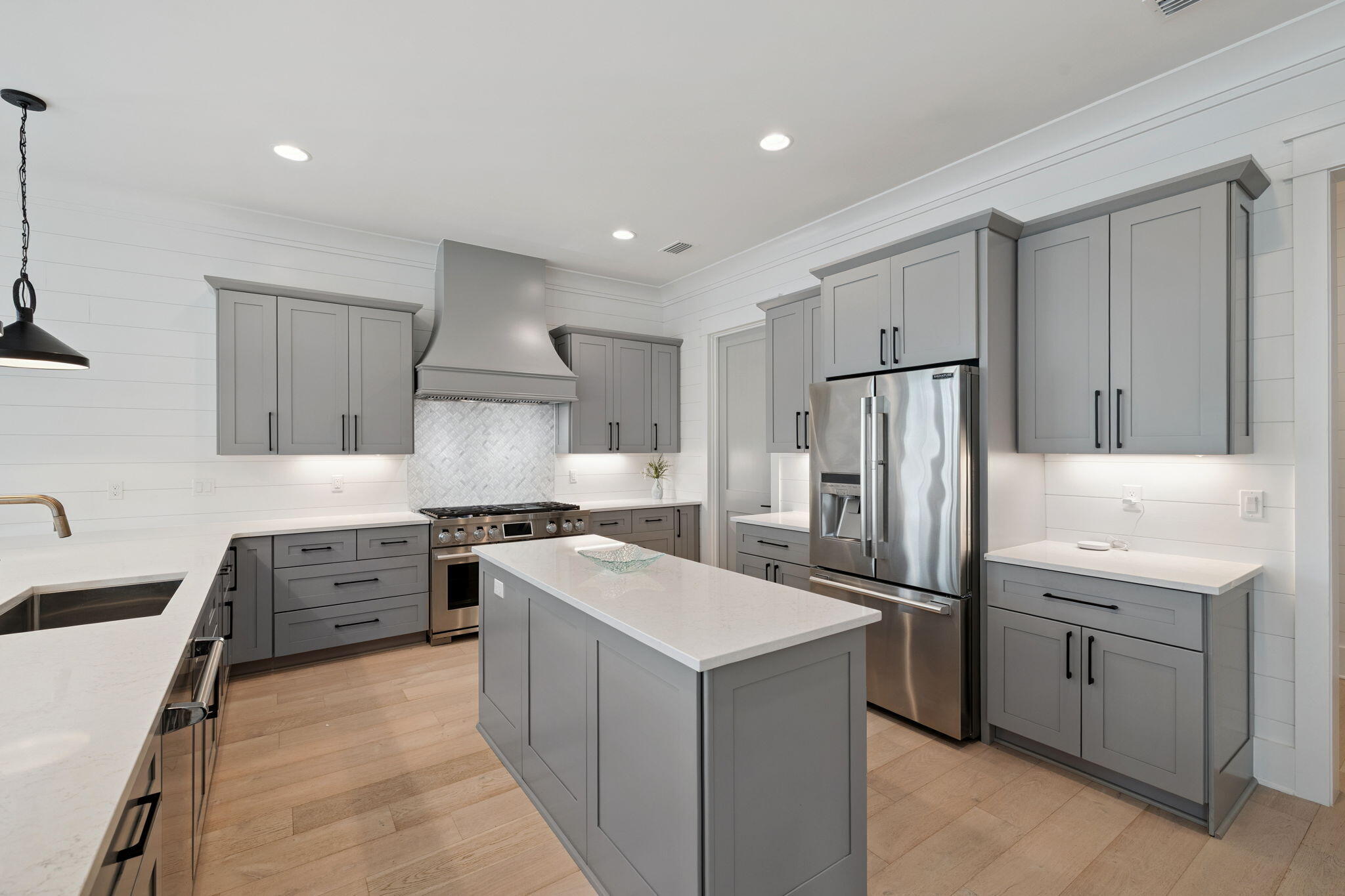 121 Needle Cast Ln Inlet Beach Inlet Beach, FL 32461 - Photo 21 of 63 a kitchen with a stove a sink and a refrigerator
