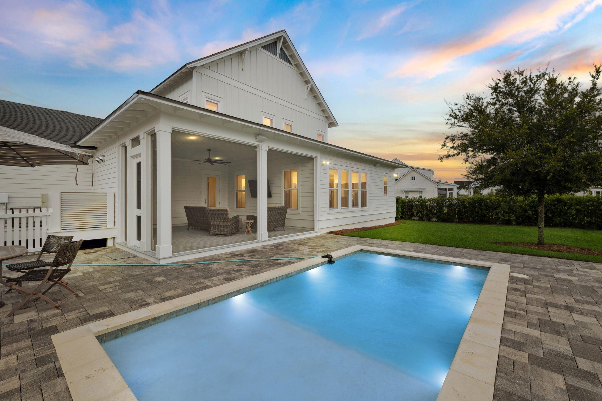 121 Needle Cast Ln Inlet Beach Inlet Beach, FL 32461 - Photo 4 of 63 a view of pool with lawn chairs and iron fence