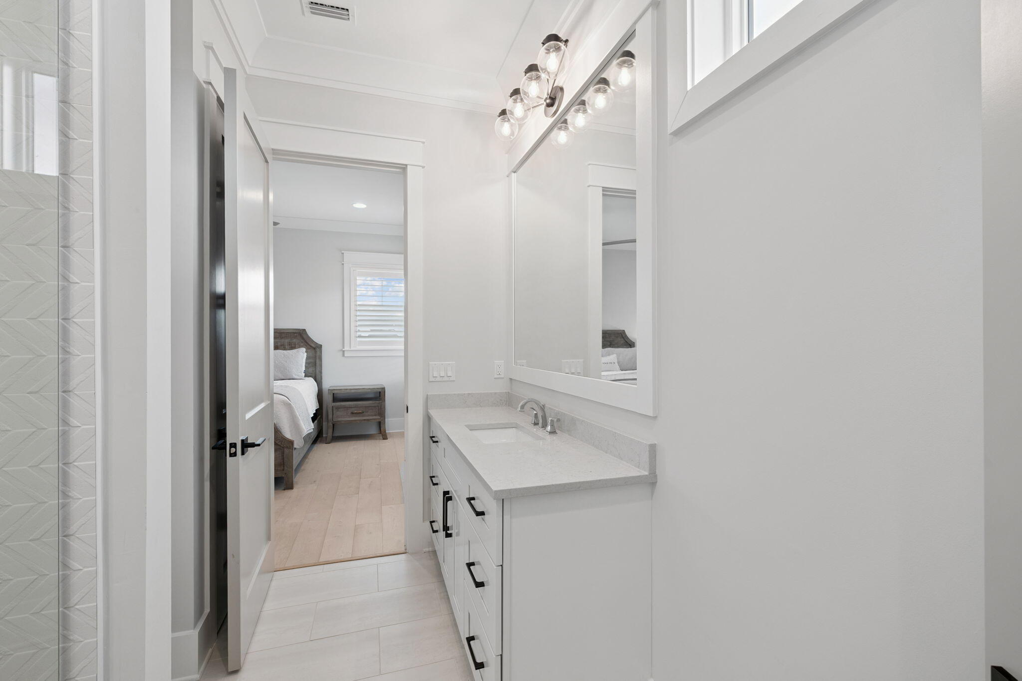 121 Needle Cast Ln Inlet Beach Inlet Beach, FL 32461 - Photo 45 of 63 a bathroom with a sink and a mirror