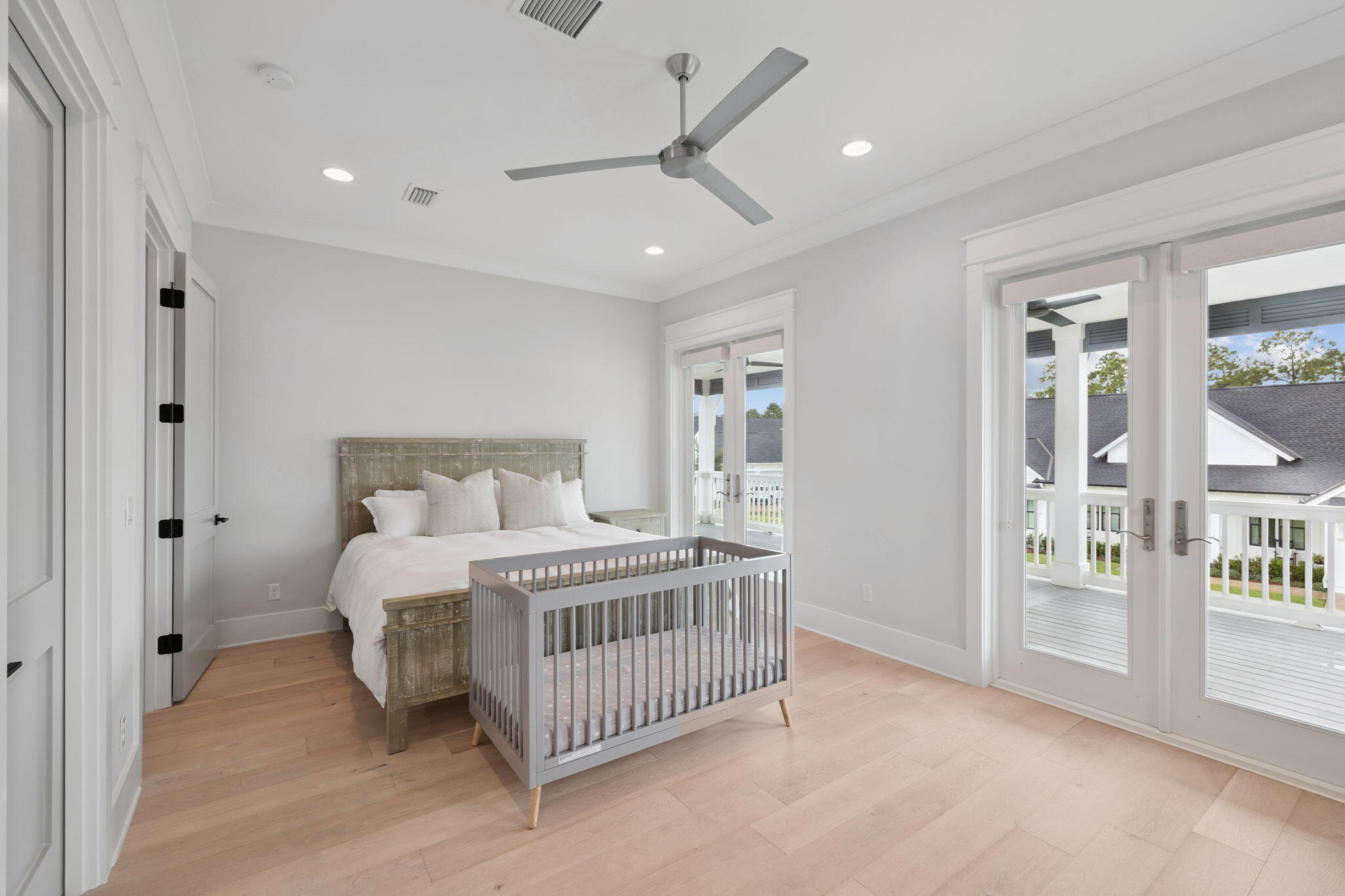 121 Needle Cast Ln Inlet Beach Inlet Beach, FL 32461 - Photo 51 of 63 a bedroom with a bed window and a ceiling fan
