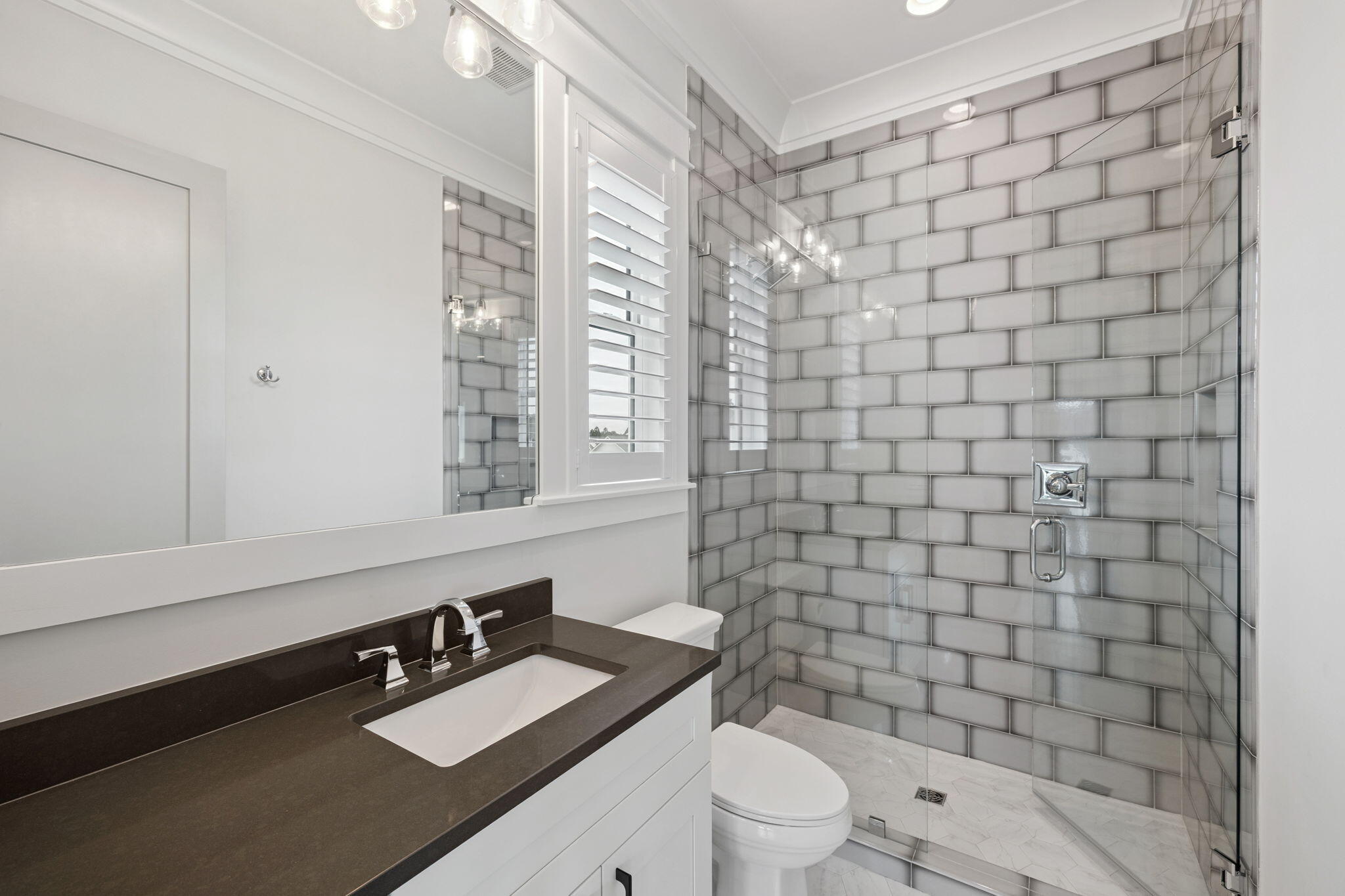 121 Needle Cast Ln Inlet Beach Inlet Beach, FL 32461 - Photo 52 of 63 a bathroom with a sink a toilet and shower curtain