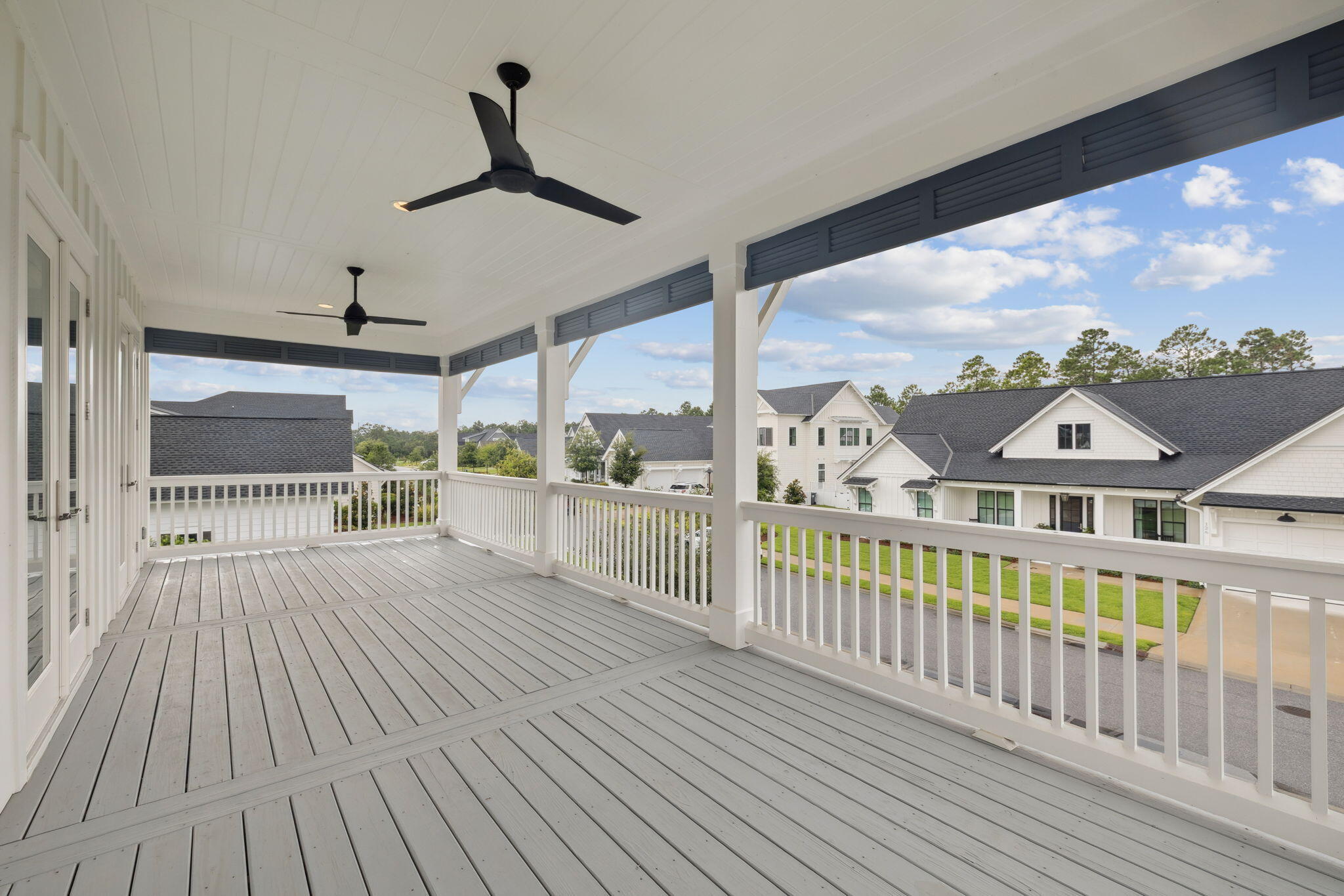 121 Needle Cast Ln Inlet Beach Inlet Beach, FL 32461 - Photo 53 of 63 a view of a balcony with wooden floor