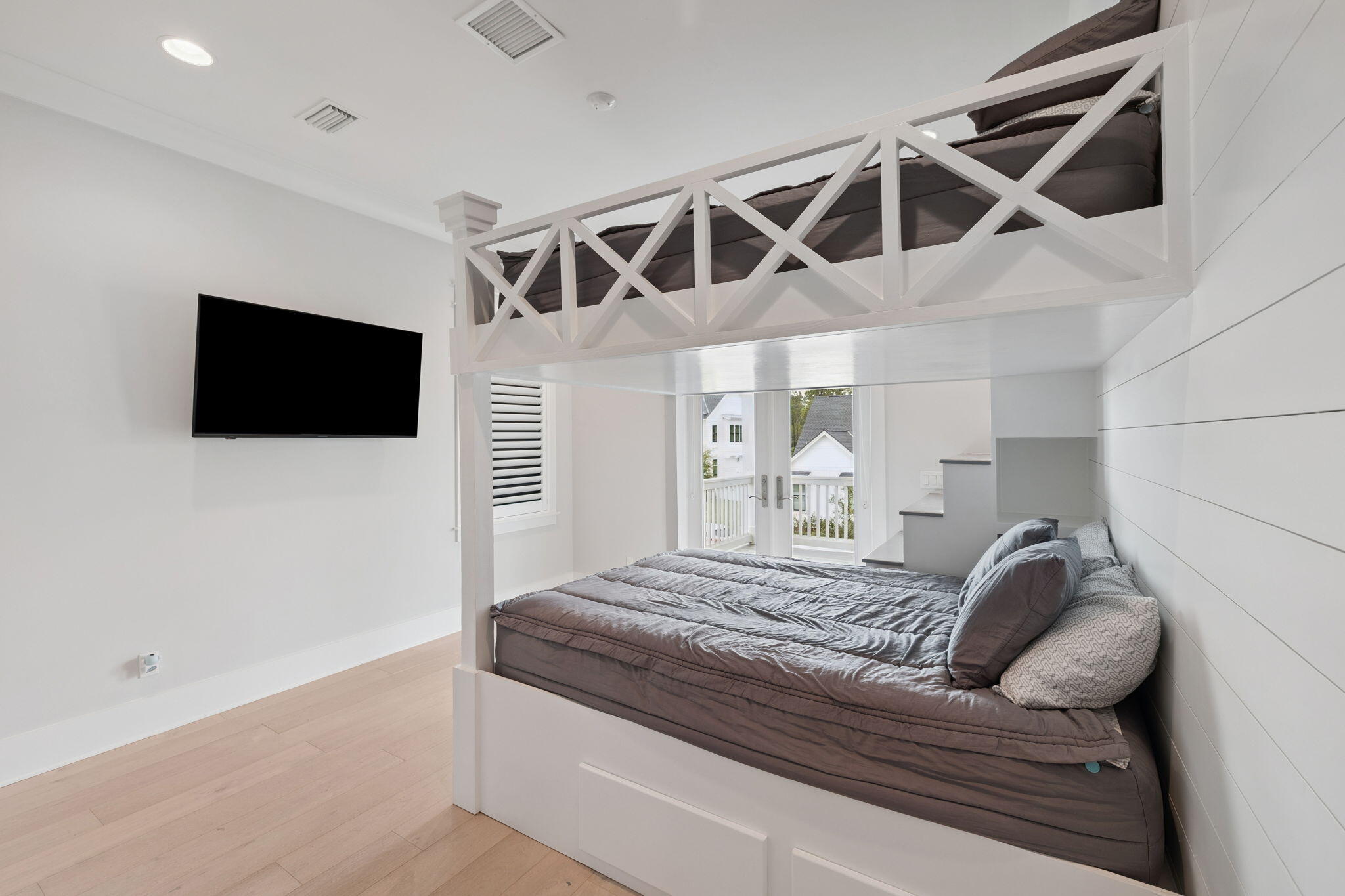 121 Needle Cast Ln Inlet Beach Inlet Beach, FL 32461 - Photo 54 of 63 a living room with furniture and a flat screen tv