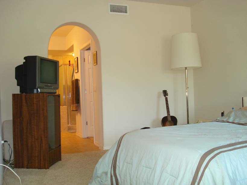 3935 East Rough Rider Road, Unit 1036 Phoenix, AZ 85050 - Photo 9 of 27 Master Bedroom