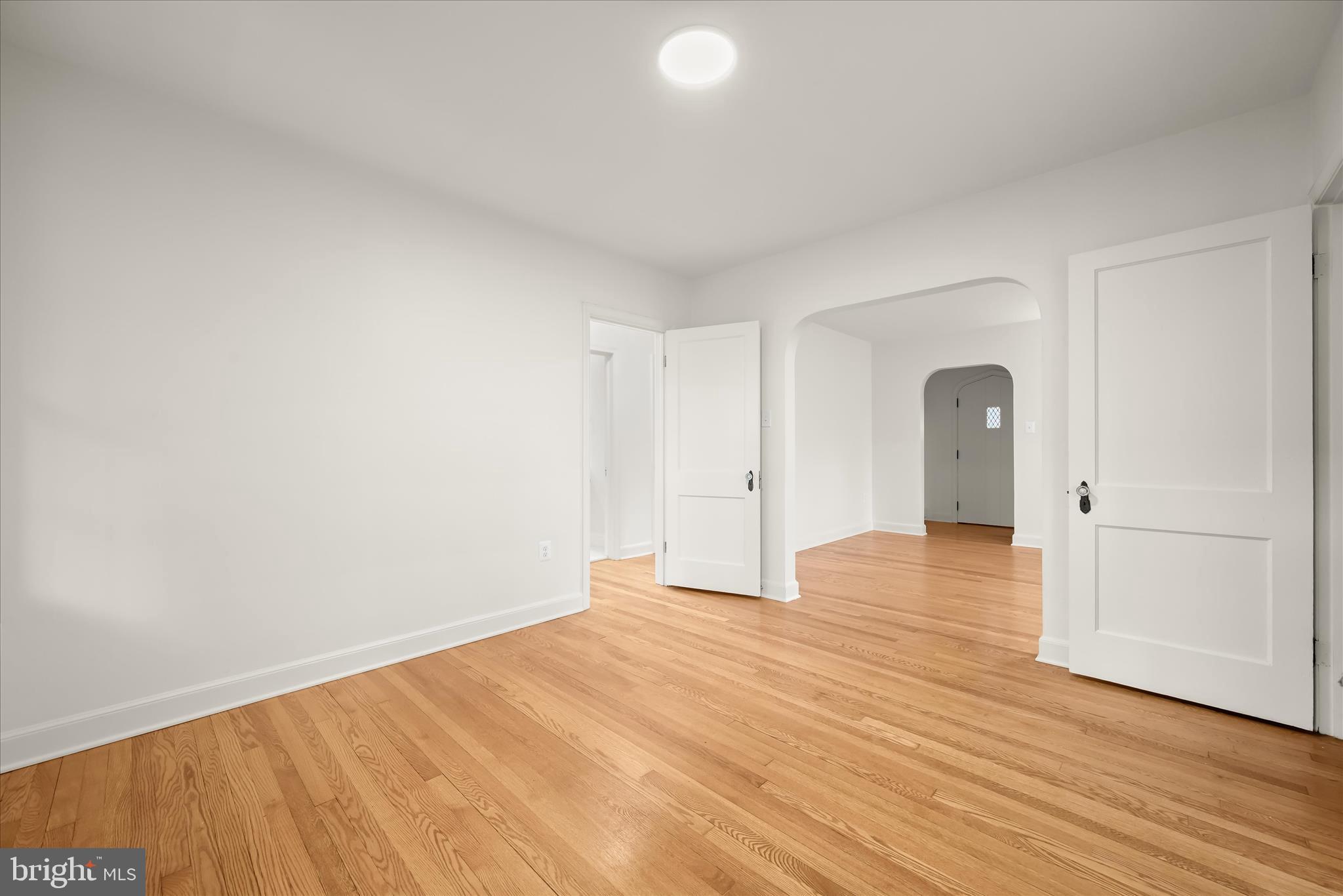 1631 Shookstown Road Frederick, MD 21702 - Photo 14 of 69 a view of empty room with wooden floor