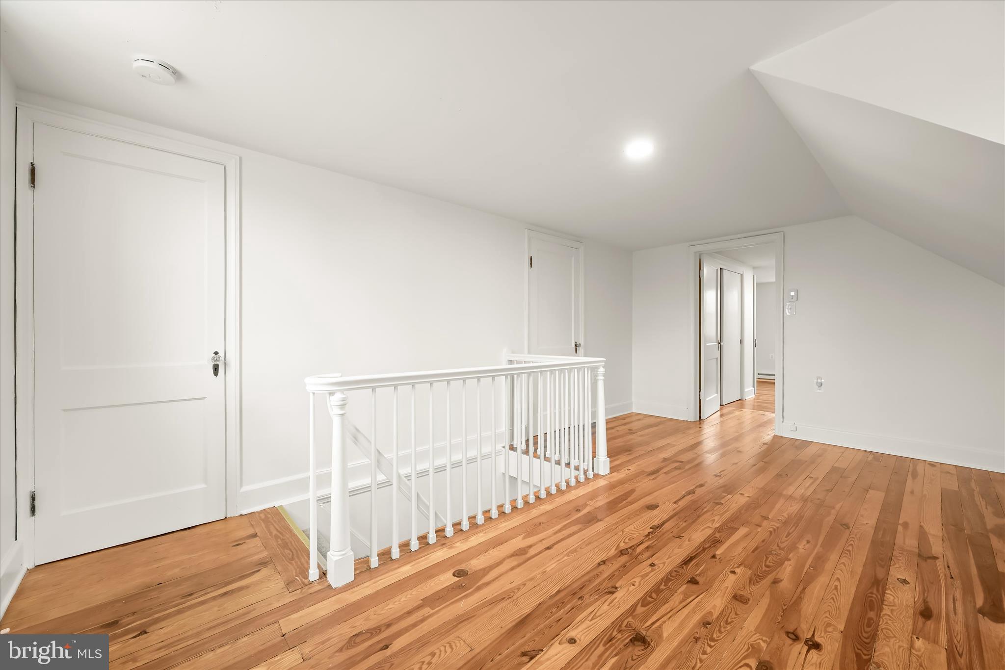 1631 Shookstown Road Frederick, MD 21702 - Photo 34 of 69 a view of an empty room with wooden floor