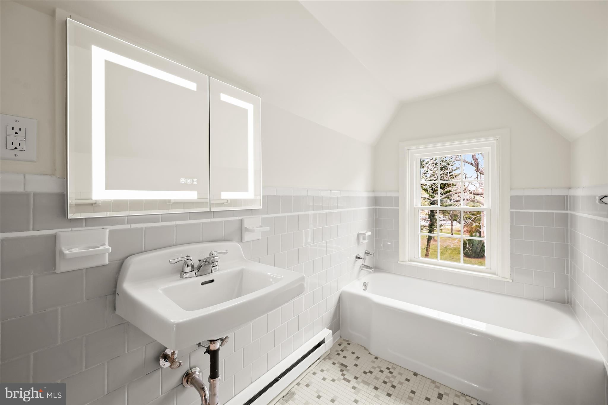 1631 Shookstown Road Frederick, MD 21702 - Photo 36 of 69 a white bath tub sitting next to a white sink