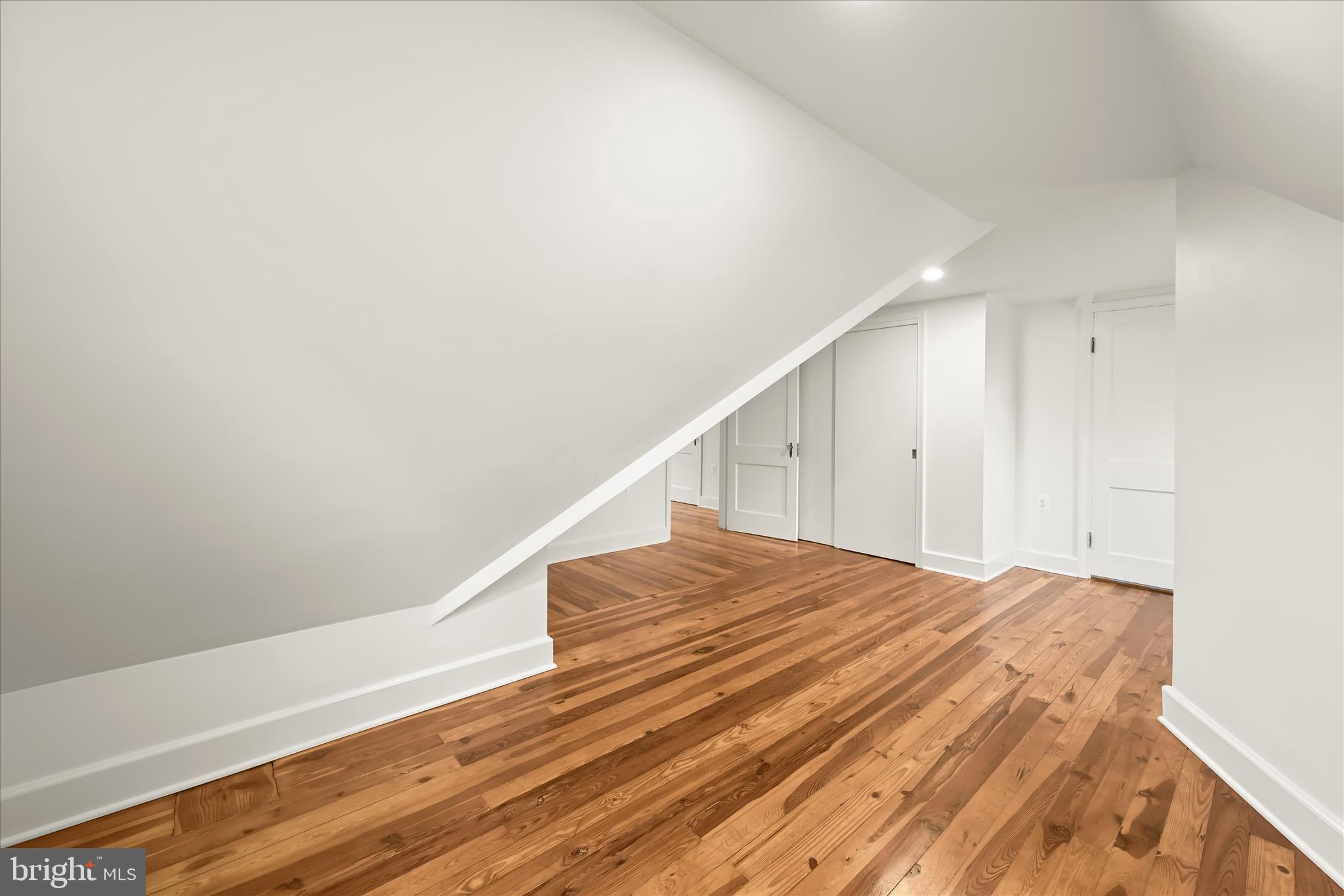 1631 Shookstown Road Frederick, MD 21702 - Photo 40 of 69 a view of a big room with wooden floor and windows