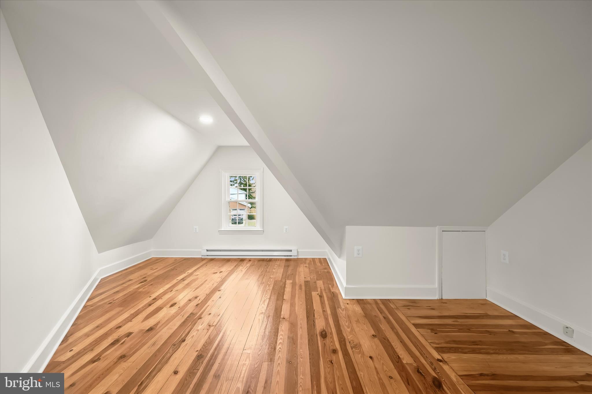 1631 Shookstown Road Frederick, MD 21702 - Photo 41 of 69 a view of a room with wooden floor and staircase