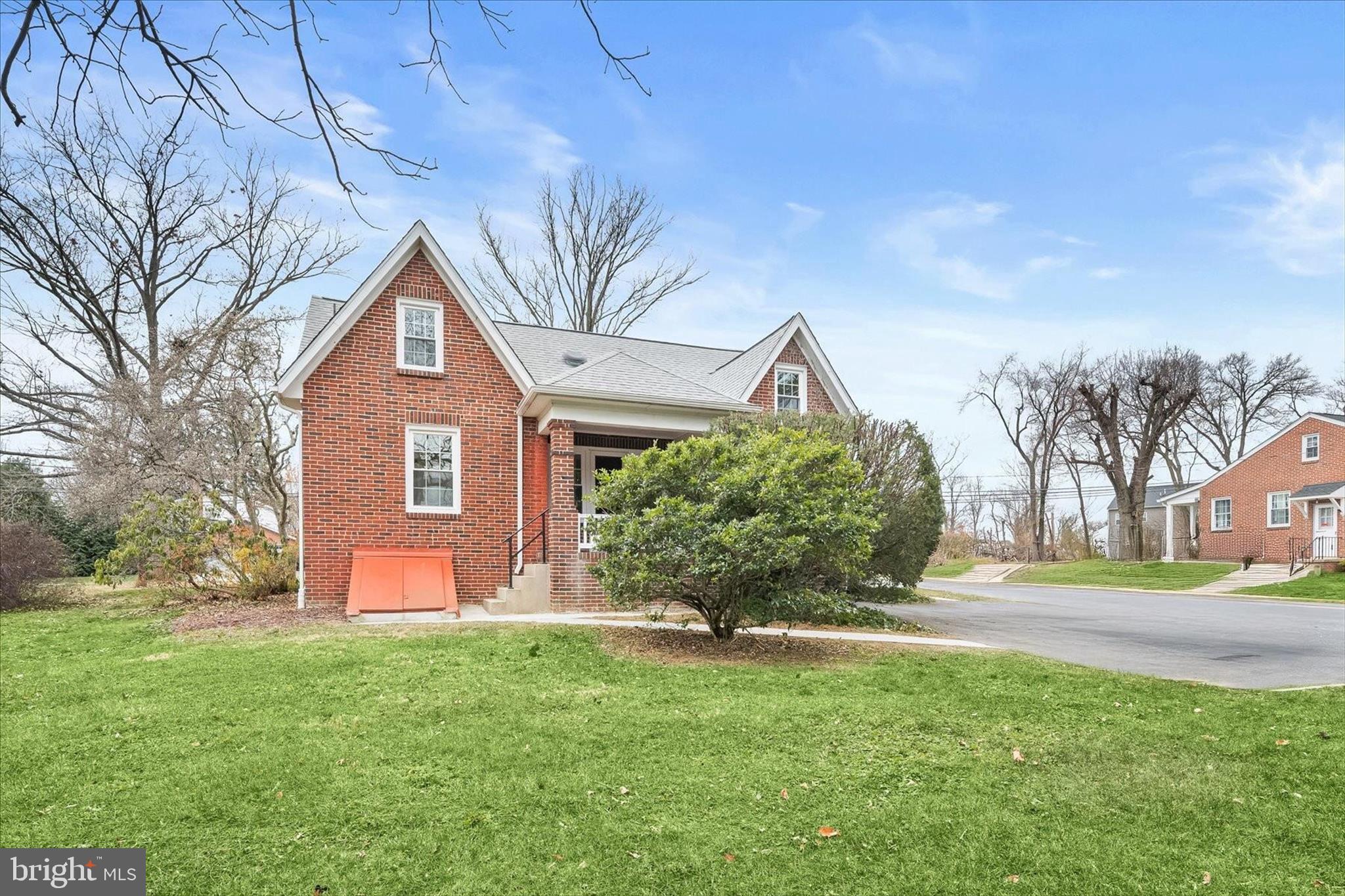 1631 Shookstown Road Frederick, MD 21702 - Photo 49 of 69 a front view of a house with a yard
