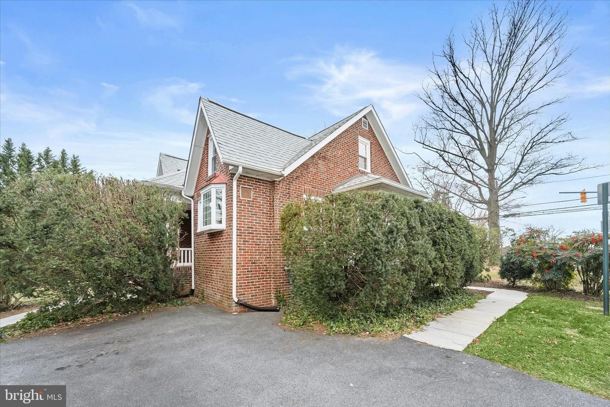 1631 Shookstown Road Frederick, MD 21702 - Photo 50 of 69 a front view of a house with garden