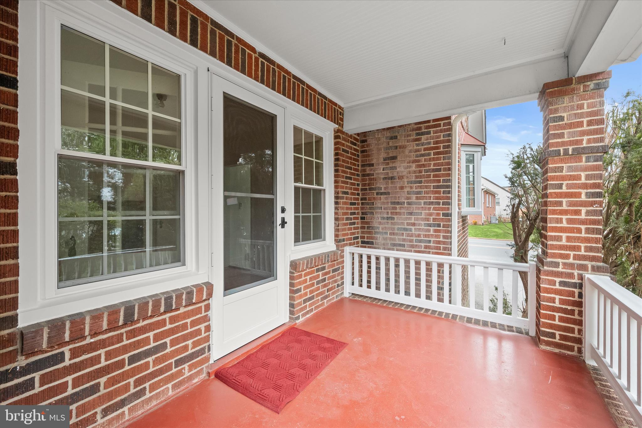 1631 Shookstown Road Frederick, MD 21702 - Photo 55 of 69 a view of a balcony with a floor to ceiling window and wooden floor
