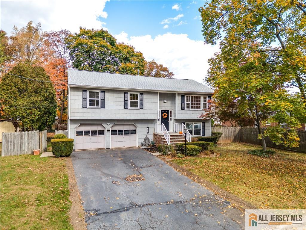 106 Farragut Avenue Middlesex, NJ 08846 - Photo 1 of 25 a view of a yard with a house
