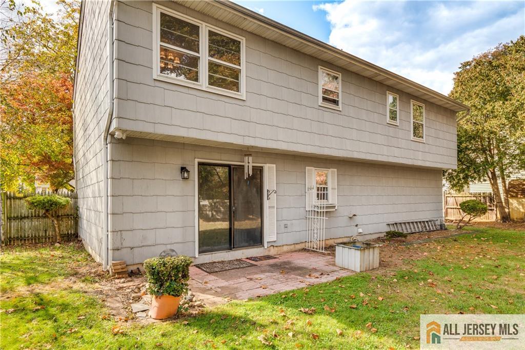 106 Farragut Avenue Middlesex, NJ 08846 - Photo 19 of 25 a front view of a house with a yard
