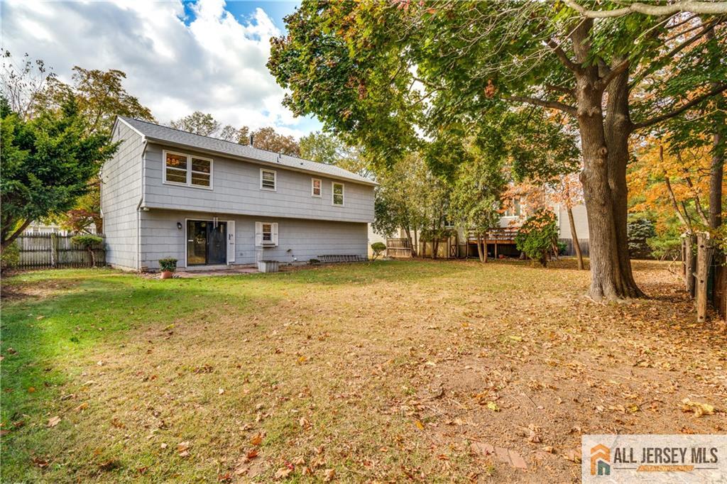 106 Farragut Avenue Middlesex, NJ 08846 - Photo 21 of 25 a view of house with yard and trees in the background