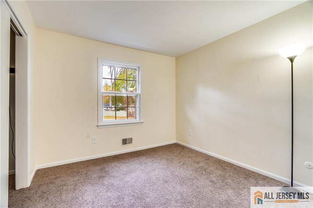 106 Farragut Avenue Middlesex, NJ 08846 - Photo 10 of 25 a view of an empty room with a window