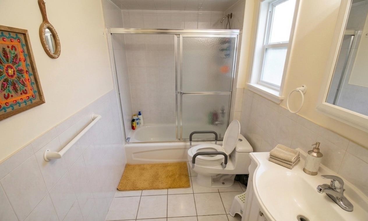 730 Humboldt Street, Unit 2 Secaucus, NJ 07094 - Photo 9 of 28 a bathroom with a sink a toilet and shower