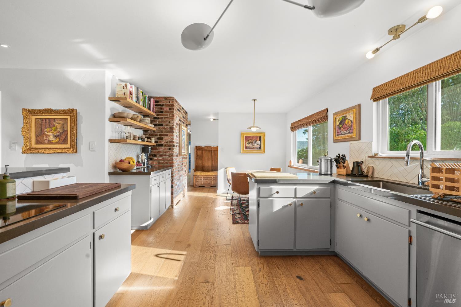 21800 River Road Geyserville, CA 95441 - Photo 13 of 30 a open kitchen with stainless steel appliances granite countertop a sink and cabinets
