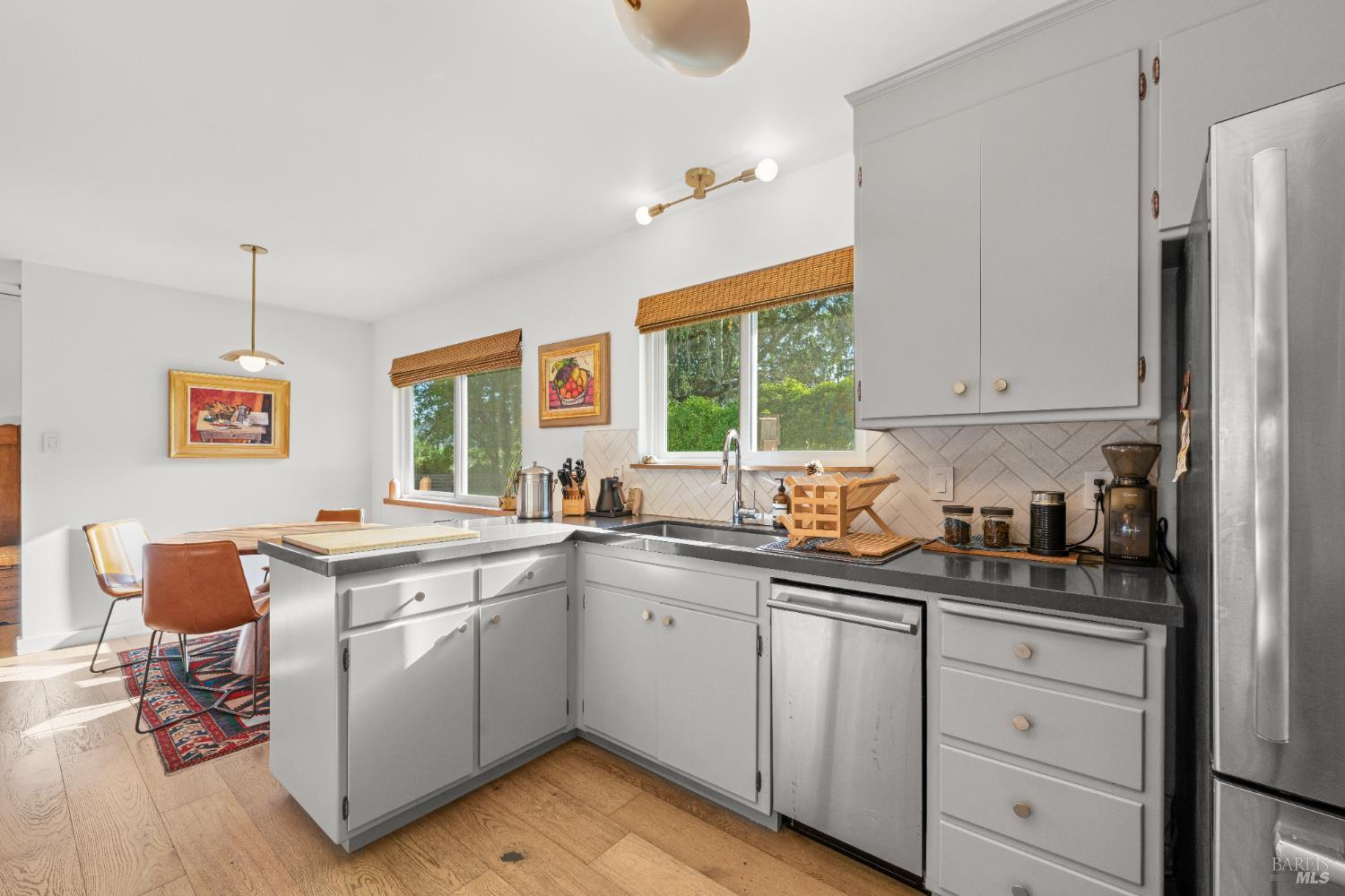 21800 River Road Geyserville, CA 95441 - Photo 14 of 30 a kitchen with stainless steel appliances granite countertop a sink stove and refrigerator