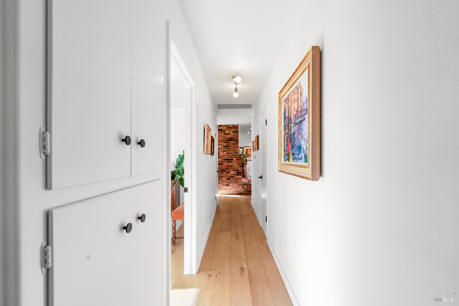 21800 River Road Geyserville, CA 95441 - Photo 18 of 30 a view of a hallway with wooden floor