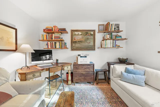 a living room with furniture and a couch