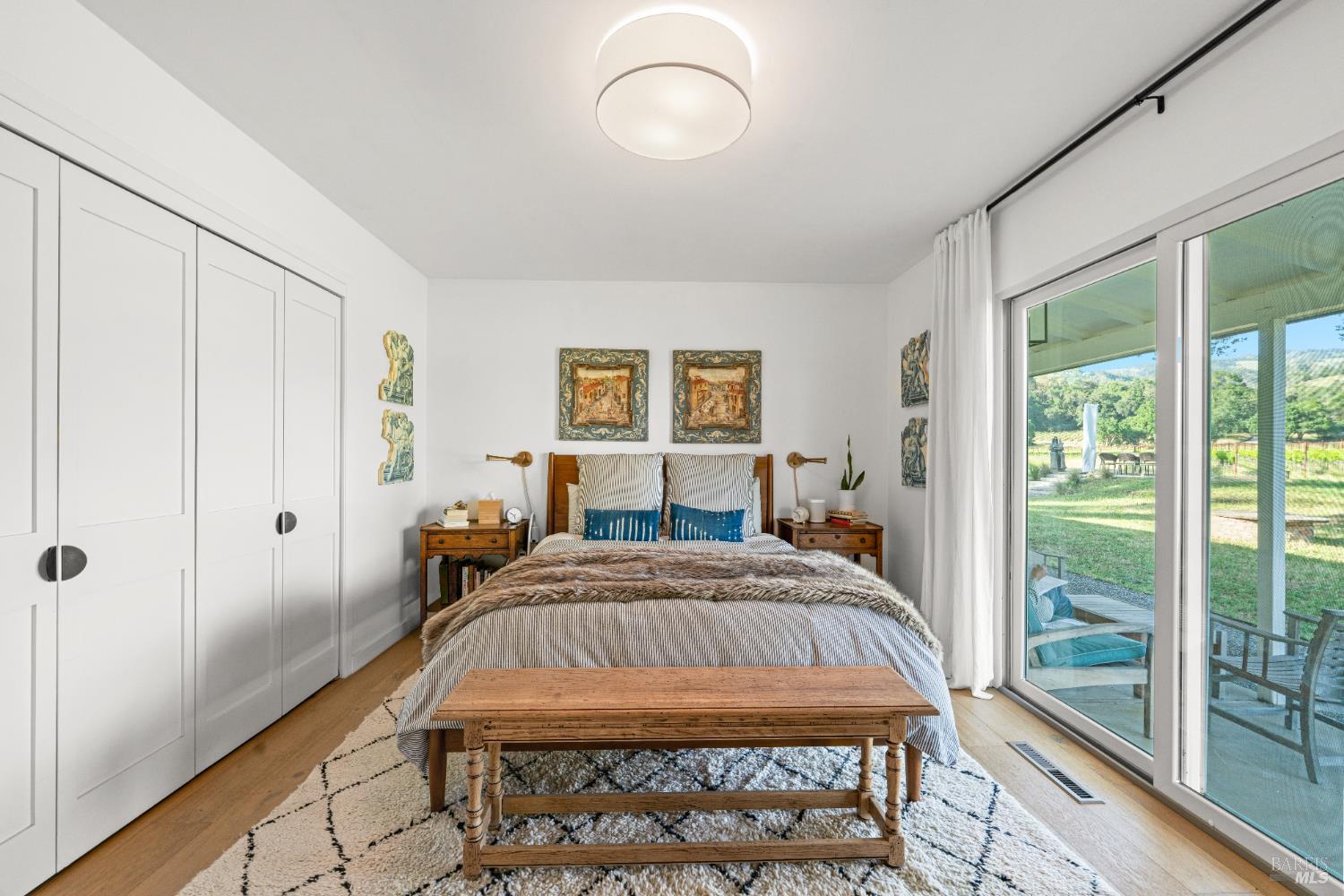 21800 River Road Geyserville, CA 95441 - Photo 24 of 30 a bed sitting in a bedroom next to a window