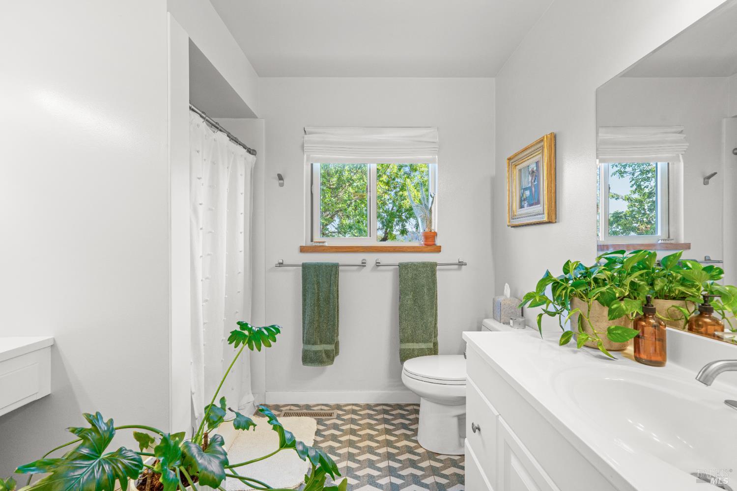 21800 River Road Geyserville, CA 95441 - Photo 25 of 30 a bath room with a toilet a window and a shower