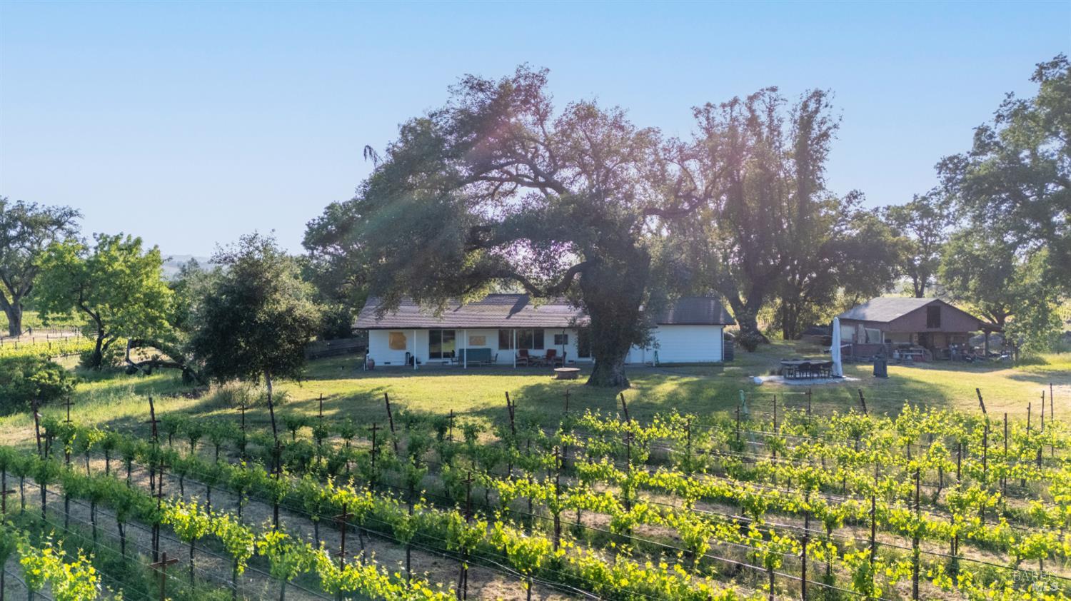 21800 River Road Geyserville, CA 95441 - Photo 30 of 30 a view of a house with swimming pool and a yard
