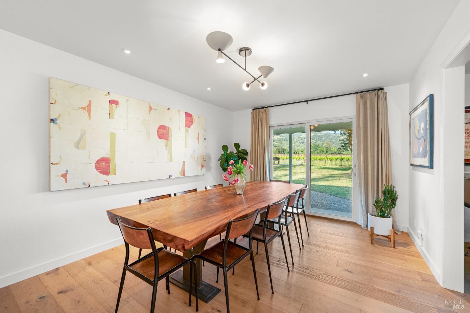 21800 River Road Geyserville, CA 95441 - Photo 7 of 30 a view of a dining room with furniture window and wooden floor