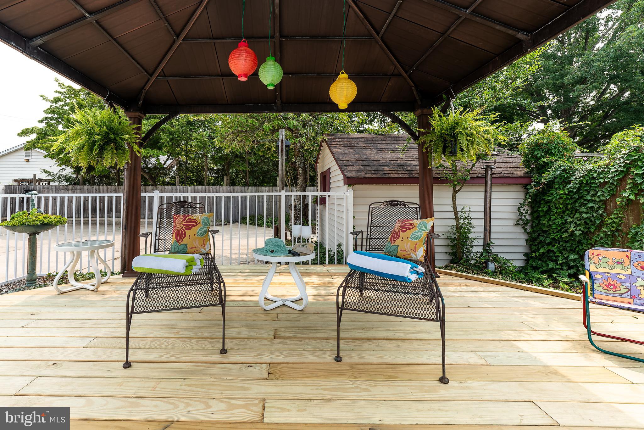 1119 Sharp Road Vineland, NJ 08360 - Photo 73 of 79 a view of a chair and tables in the patio