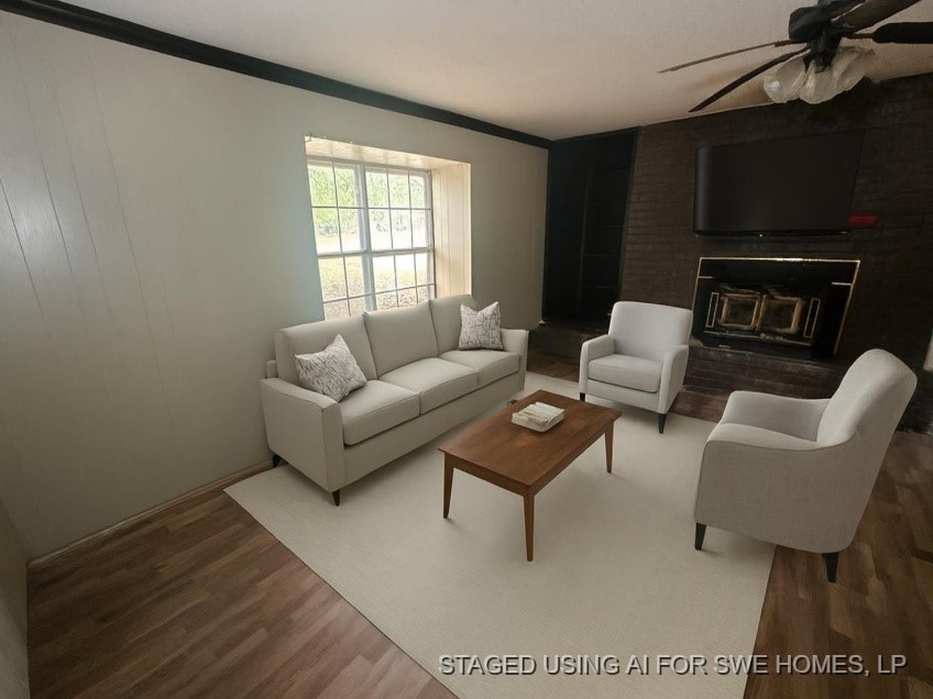 447 Plum Creek Road Longview, TX 75605 - Photo 4 of 11 a living room with furniture and a fireplace