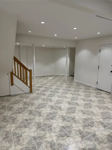a view of a hallway with a room