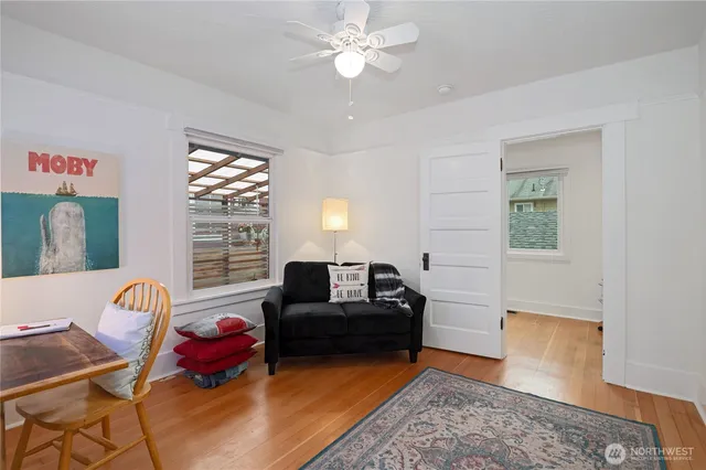 a living room with furniture and a window