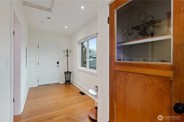 a view of an empty room with closet