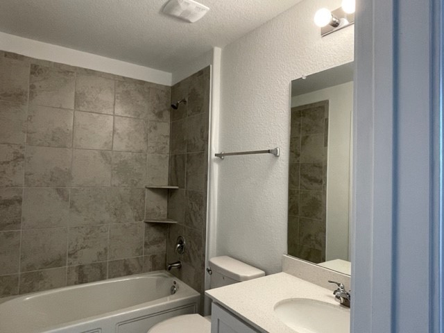 10413 Premier Park Street Austin, TX 78747 - Photo 15 of 24 a bathroom with a shower and a toilet