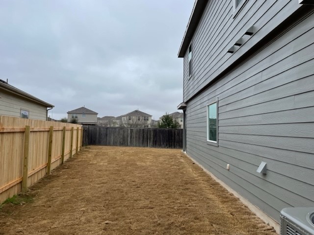 10413 Premier Park Street Austin, TX 78747 - Photo 21 of 24 a view of backyard of house