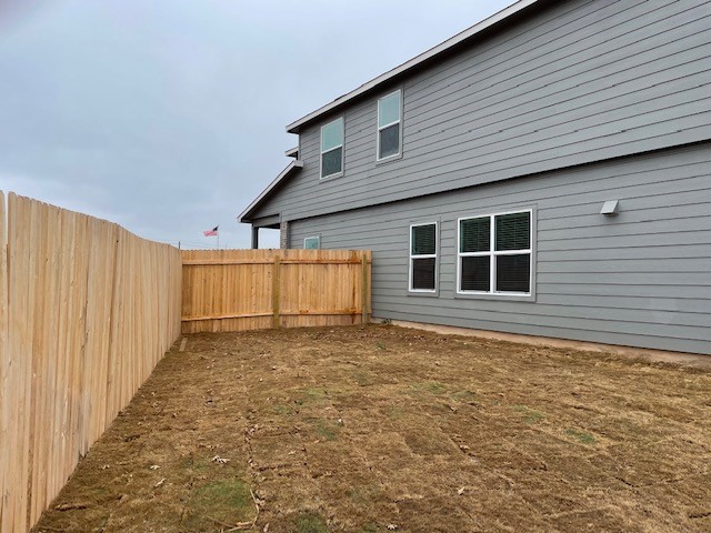 10413 Premier Park Street Austin, TX 78747 - Photo 22 of 24 a view of a backyard