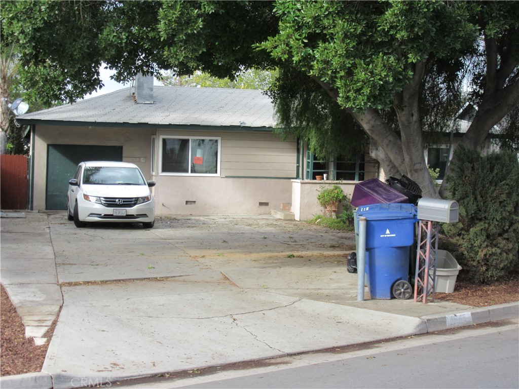 4645 High Street Riverside, CA 92507 - Photo 1 of 1 a car parked in front of a house