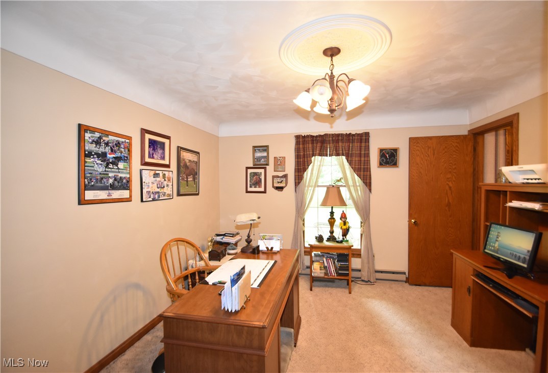 11676 Lisbon Road Salem, OH 44460 - Photo 12 of 38 Home office with a chandelier and light carpet