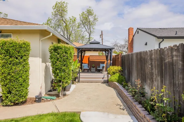 a house view with a outdoor space
