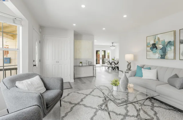 a living room with furniture and a couch